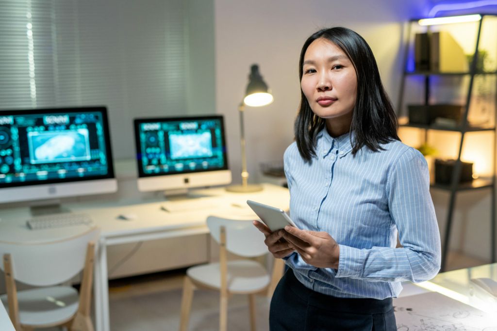 asian-woman-in-shirt-holding-tablet-2025-03-17-05-19-02-utc-1024x683.jpg