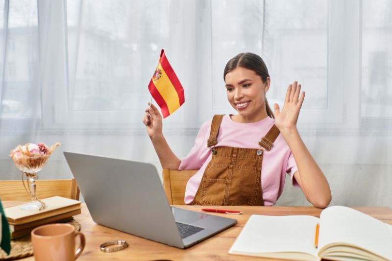 Remote freelancer based in Spain communicating with international clients from a home office